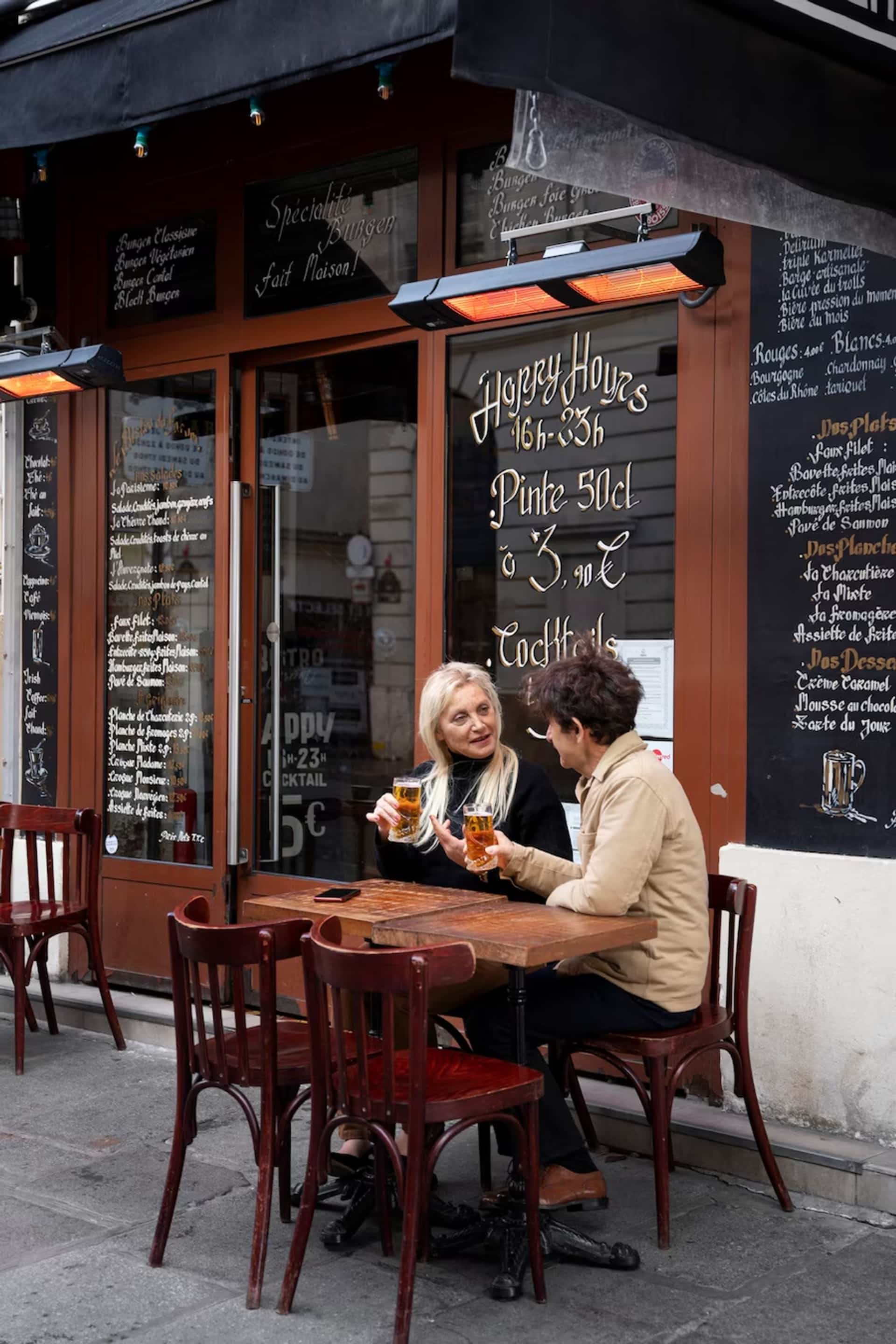 two people having a drink together at a pub