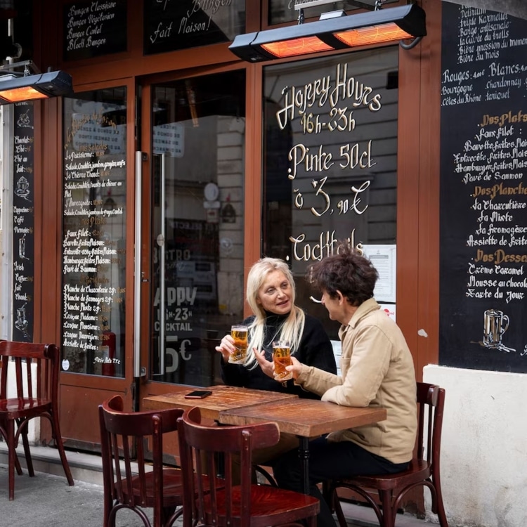 two people having a drink together at a pub